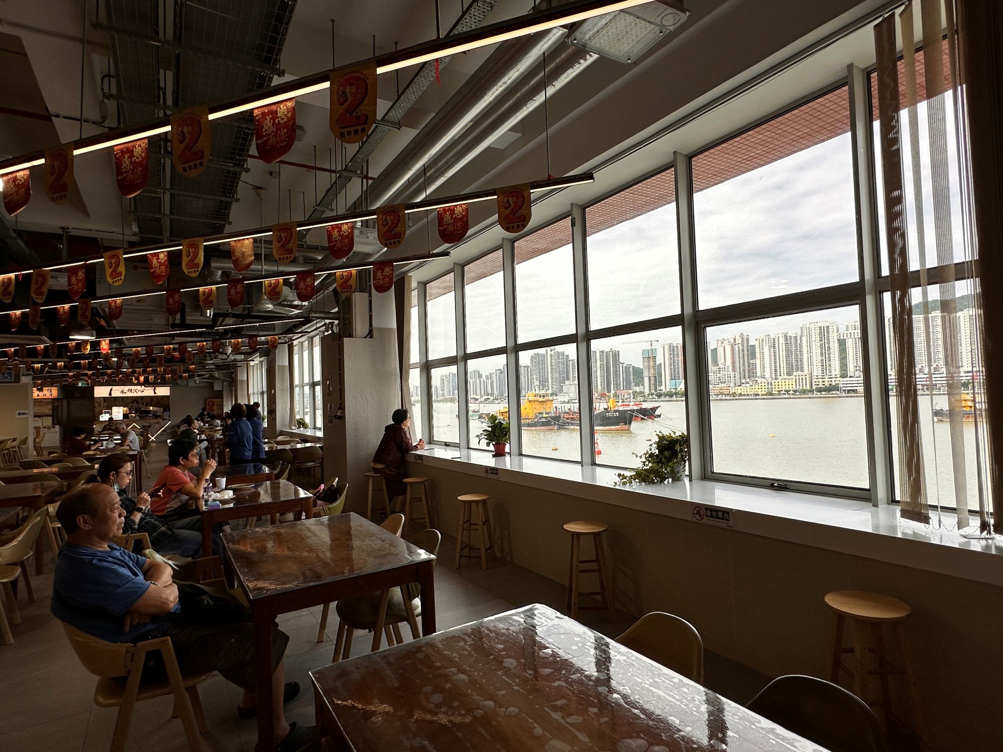 Patane Market Food Court, with a commanding view of the vibrant fishing harbor